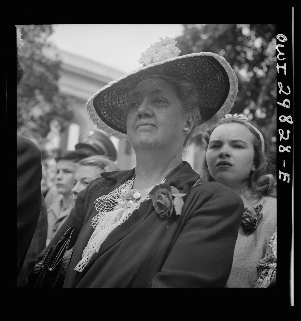 [Untitled photo, possibly related to: Arlington Cemetery, Arlington, Virginia. A girl watching Colonel Hammond lay the…