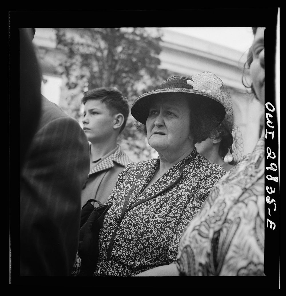 Arlington Cemetery, Arlington, Virginia. A woman watching Colonel Hammond lay the President's wreath on the Tomb of the…