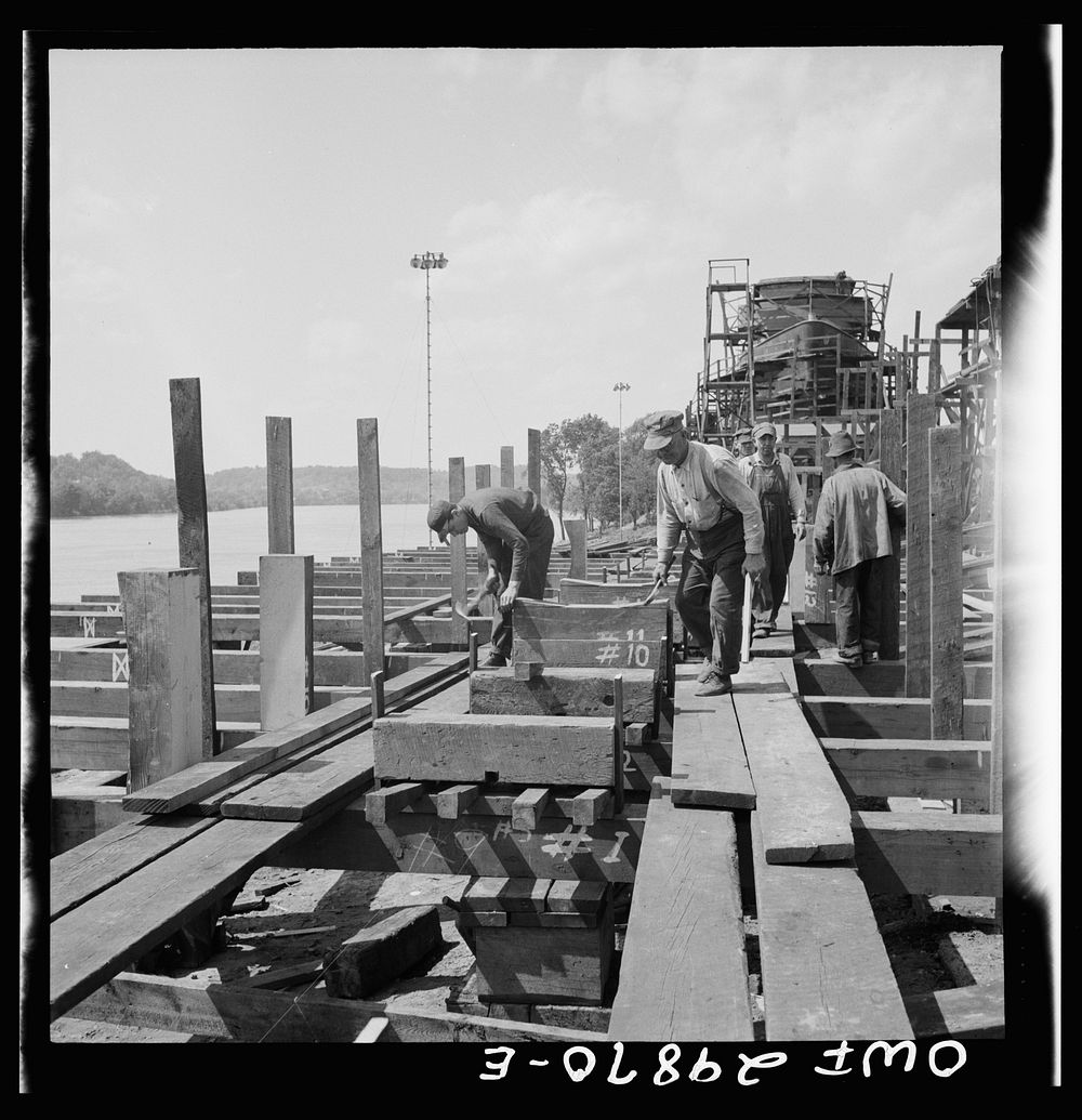 Point Pleasant, West Virginia. Laying the keel block for the United States Army LT boats at the Marietta Manufacturing…