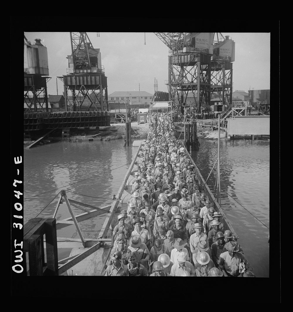 [Untitled photo, possibly related to: Beaumont, Texas. Shipyard workers leaving the Pennsylvania shipyards at the change of…
