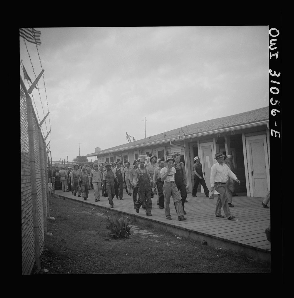 [Untitled photo, possibly related to: Beaumont, Texas. Workers leaving the Pennsylvania shipyards at the change of shift].…