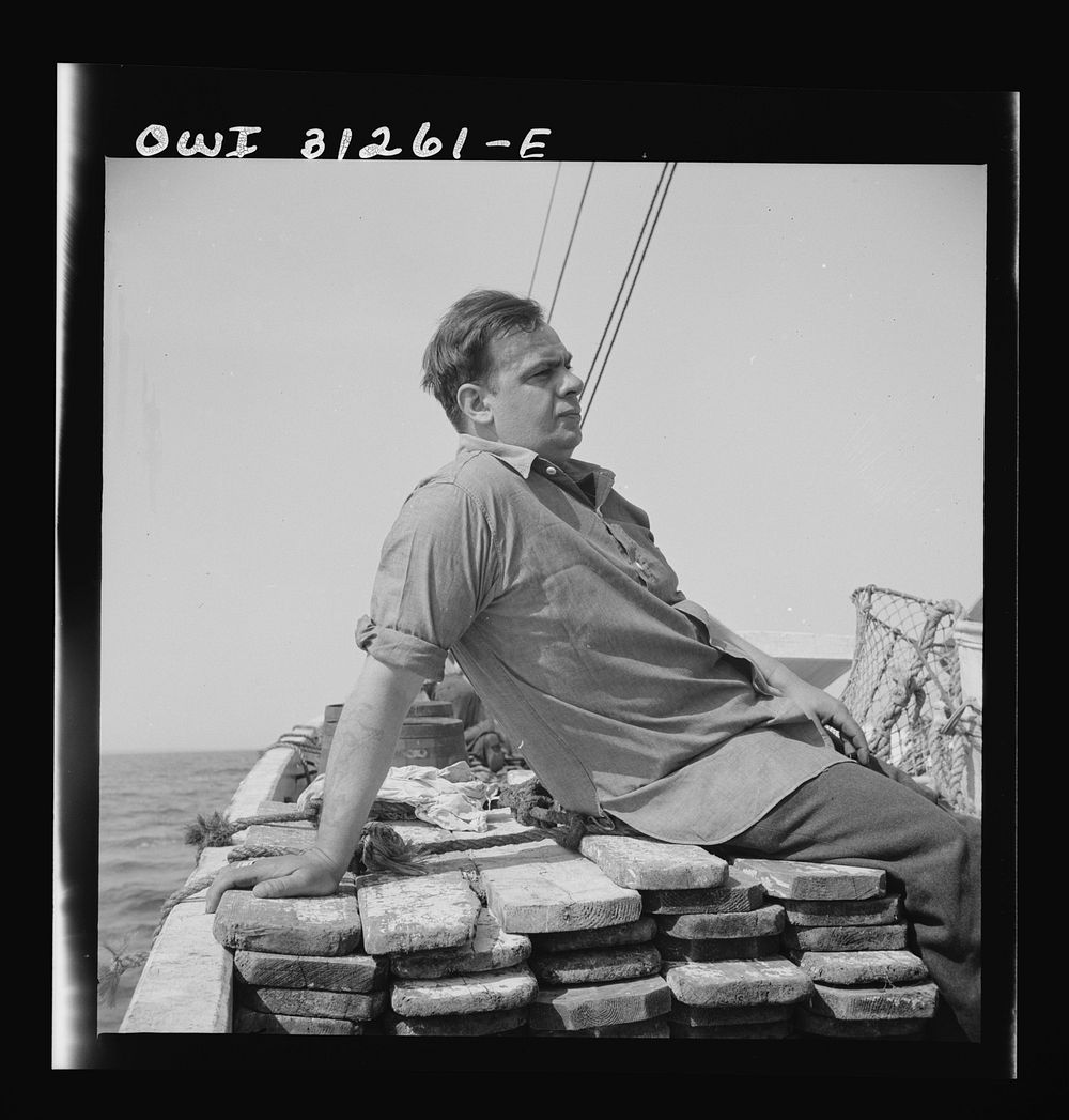 On board the fishing boat Alden out of Gloucester, Massachusetts. Dominic Tello, Italian fisherman. Sourced from the Library…