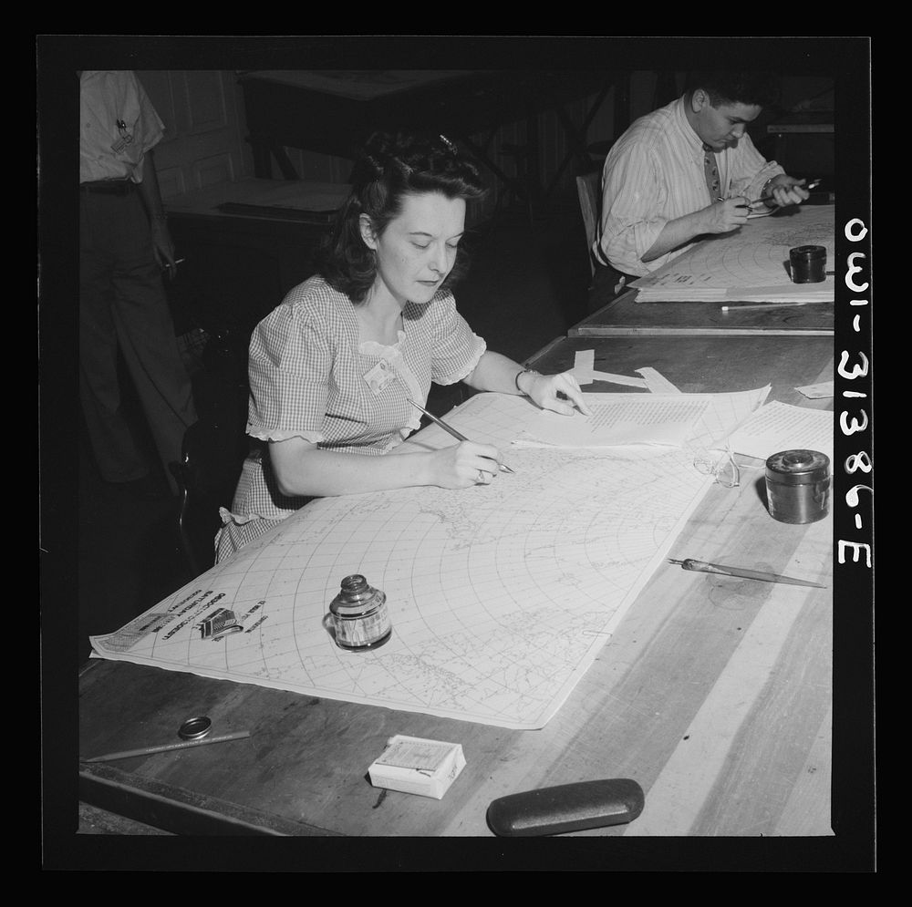 [Untitled photo, possibly related to: Washington, D.C. Preparing an advisory forecast at the U.S. Weather Bureau. Preparing…