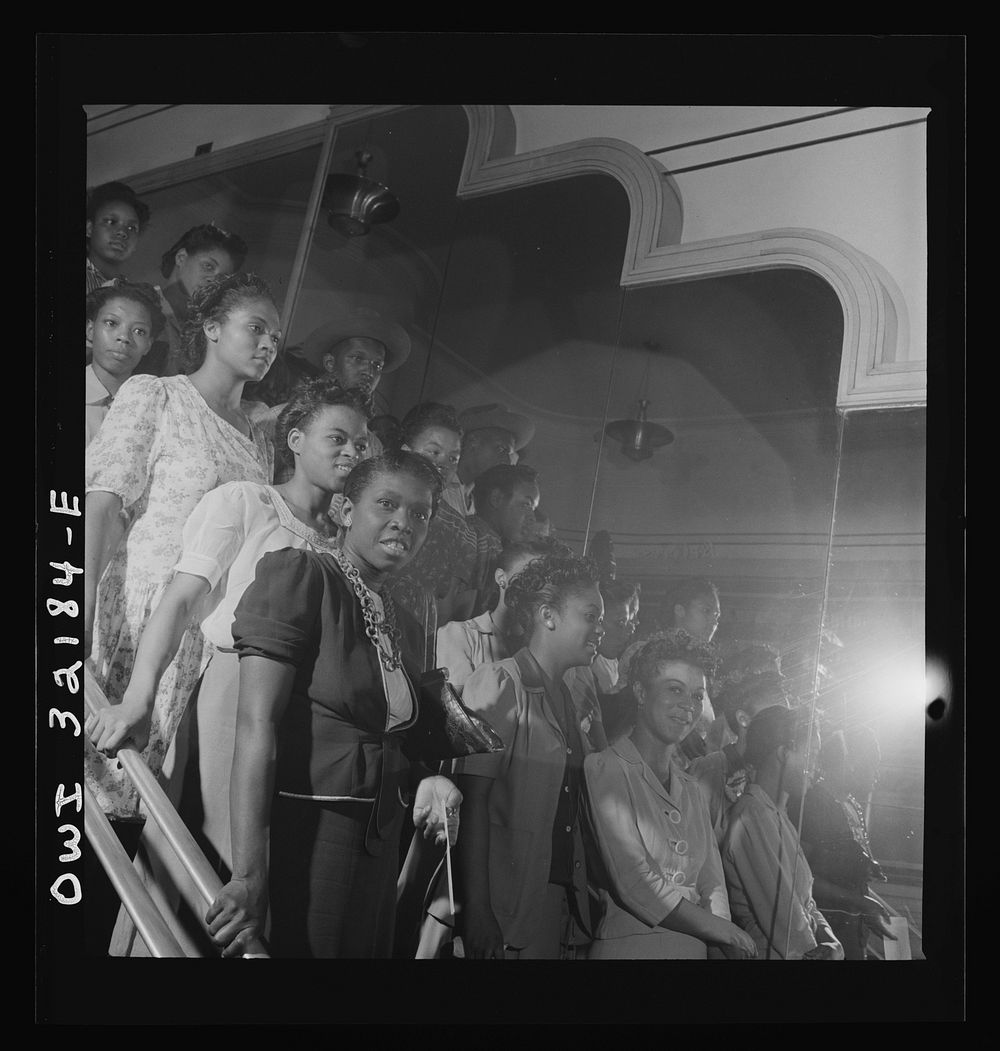 [Untitled photo, possibly related to: Washington, D.C. Part of a crowd waiting their turn in a shoe store on the last day on…