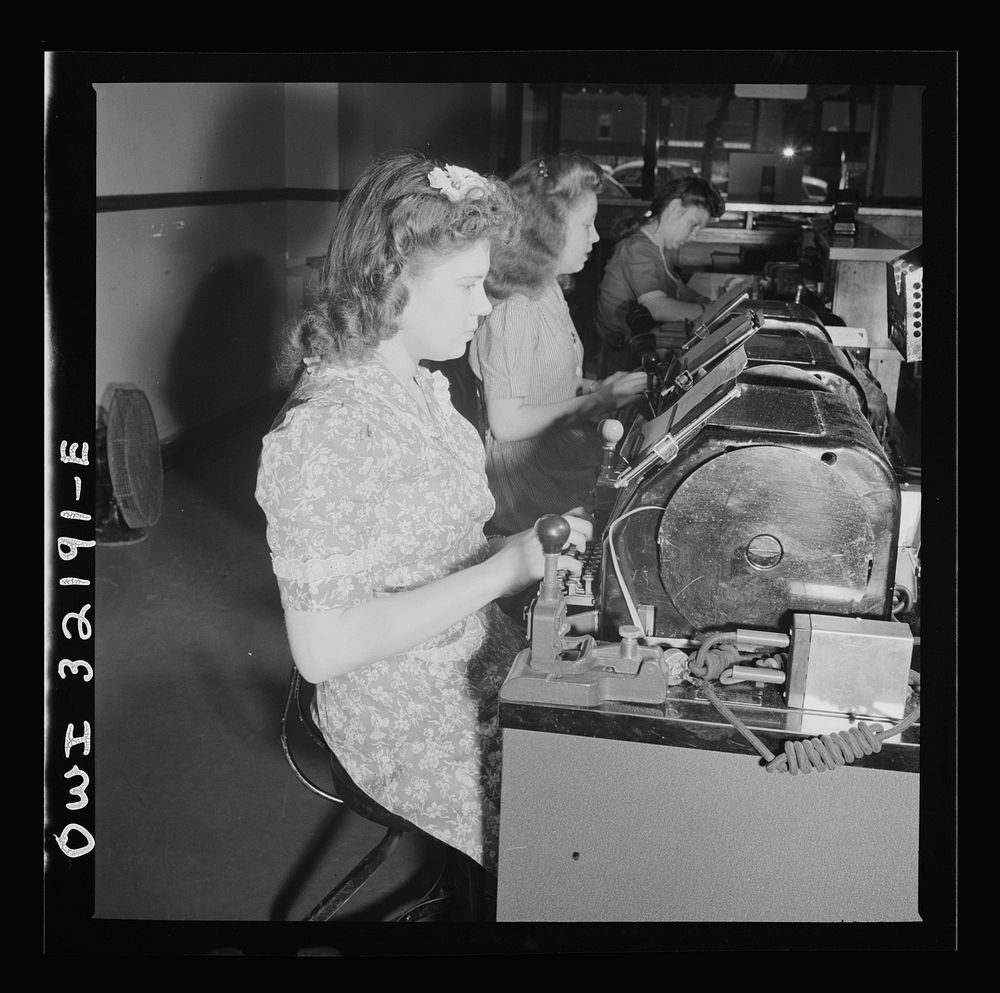 [Untitled photo, possibly related to: Washington, D.C. Jean Smith sending a Western Union telegram on the teleprinter to New…