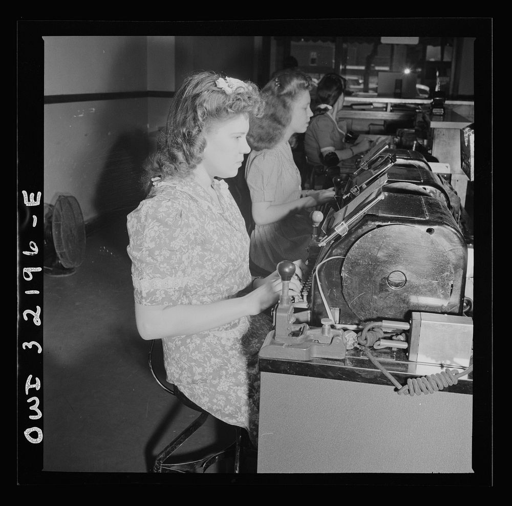 Washington, D.C. Jean Smith sending a Western Union telegram on the teleprinter to New York. Sourced from the Library of…