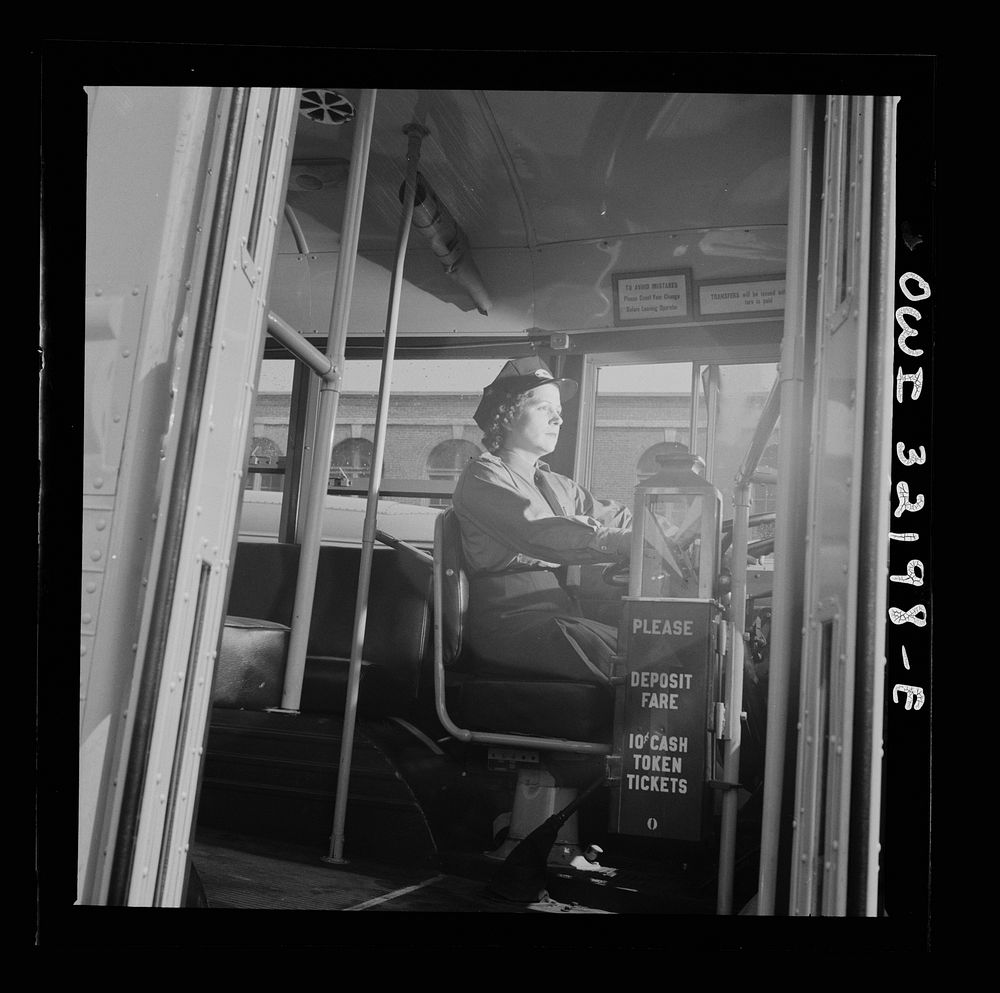 [Untitled photo, possibly related to: Washington, D.C. An instructor of the Capitol Transit Company teaching a woman to…