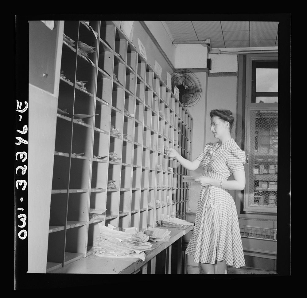 Washington, D.C. Miss Jane Anderson filling telegrams at the Western Union telegraph office. Sourced from the Library of…