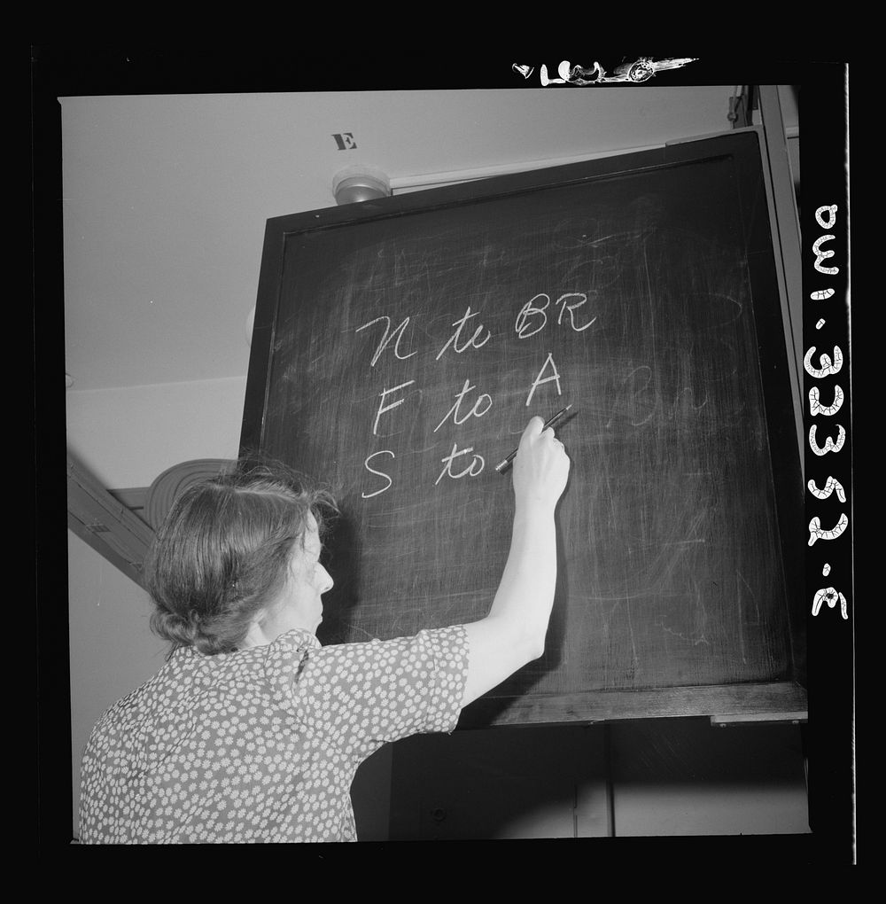Washington, D.C. Mrs. Susan Poyce writing switching instructions on a board at the Western Union telegraph office. Sourced…