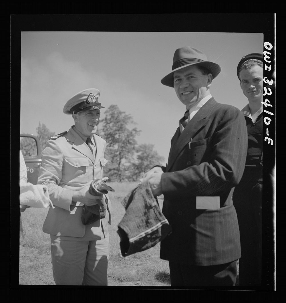 [Untitled photo, possibly related to: Oswego, New York. United Nations heroes taking their pick of bathing suits loaned by…