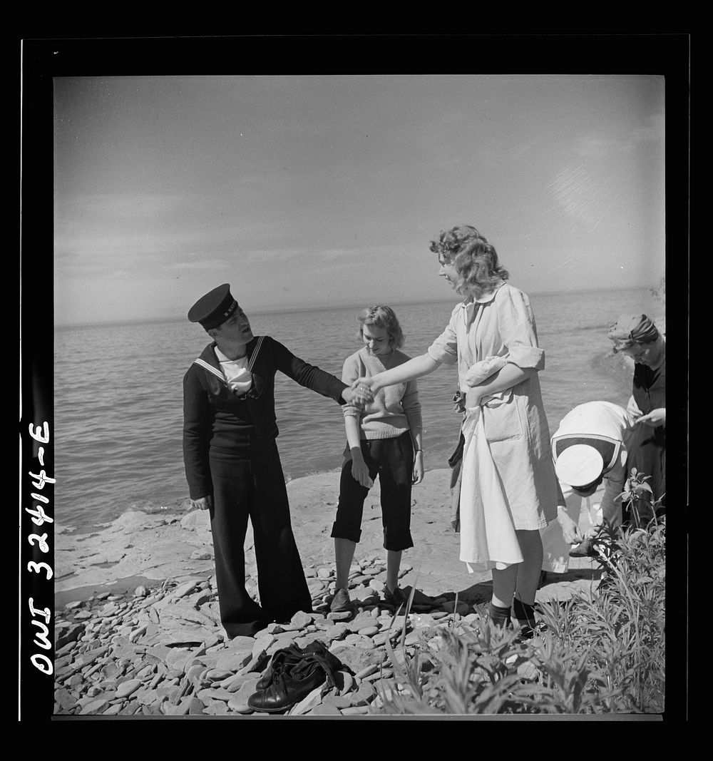 [Untitled photo, possibly related to: Oswego, New York. United Nations heroes with their hostesses by Lake Ontario, at a…
