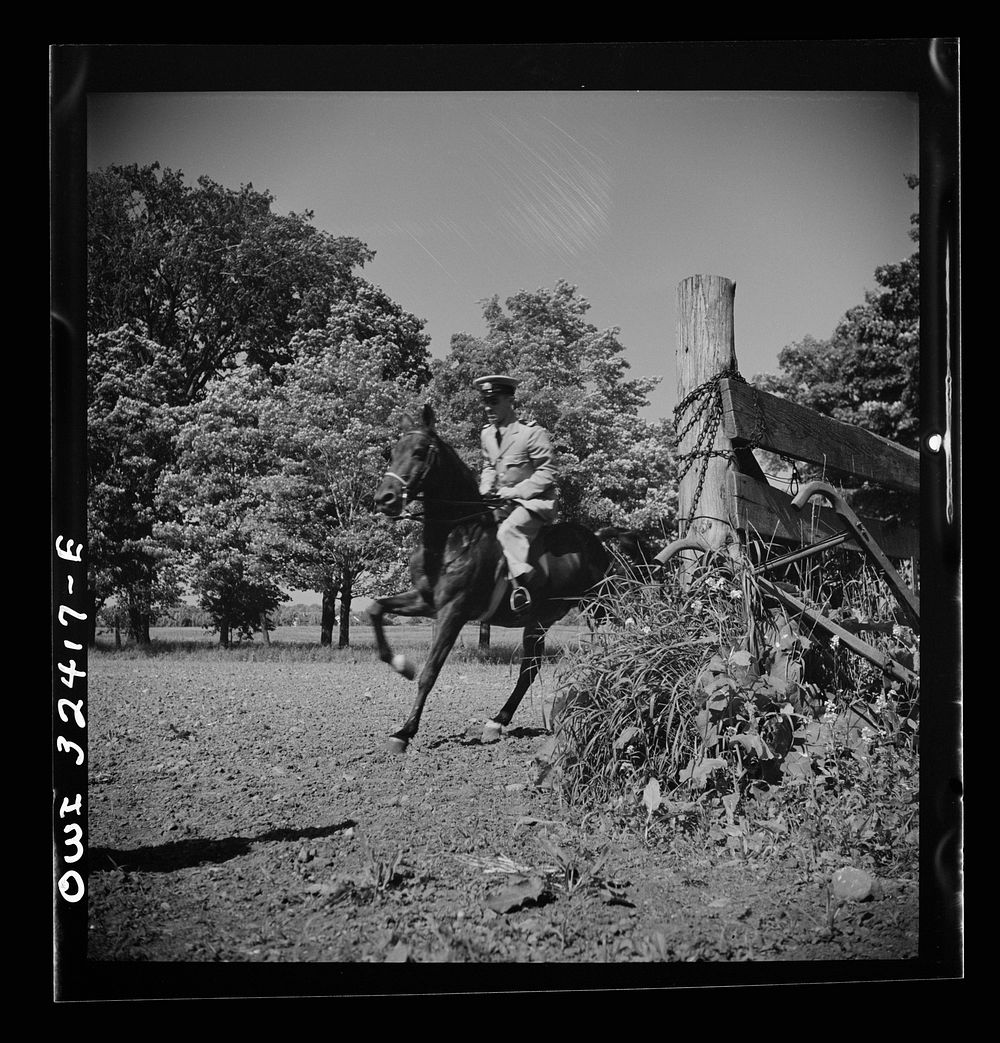 [Untitled photo, possibly related to: Oswego, New York. Belgian sailor riding at a farm where the heroes were entertained…