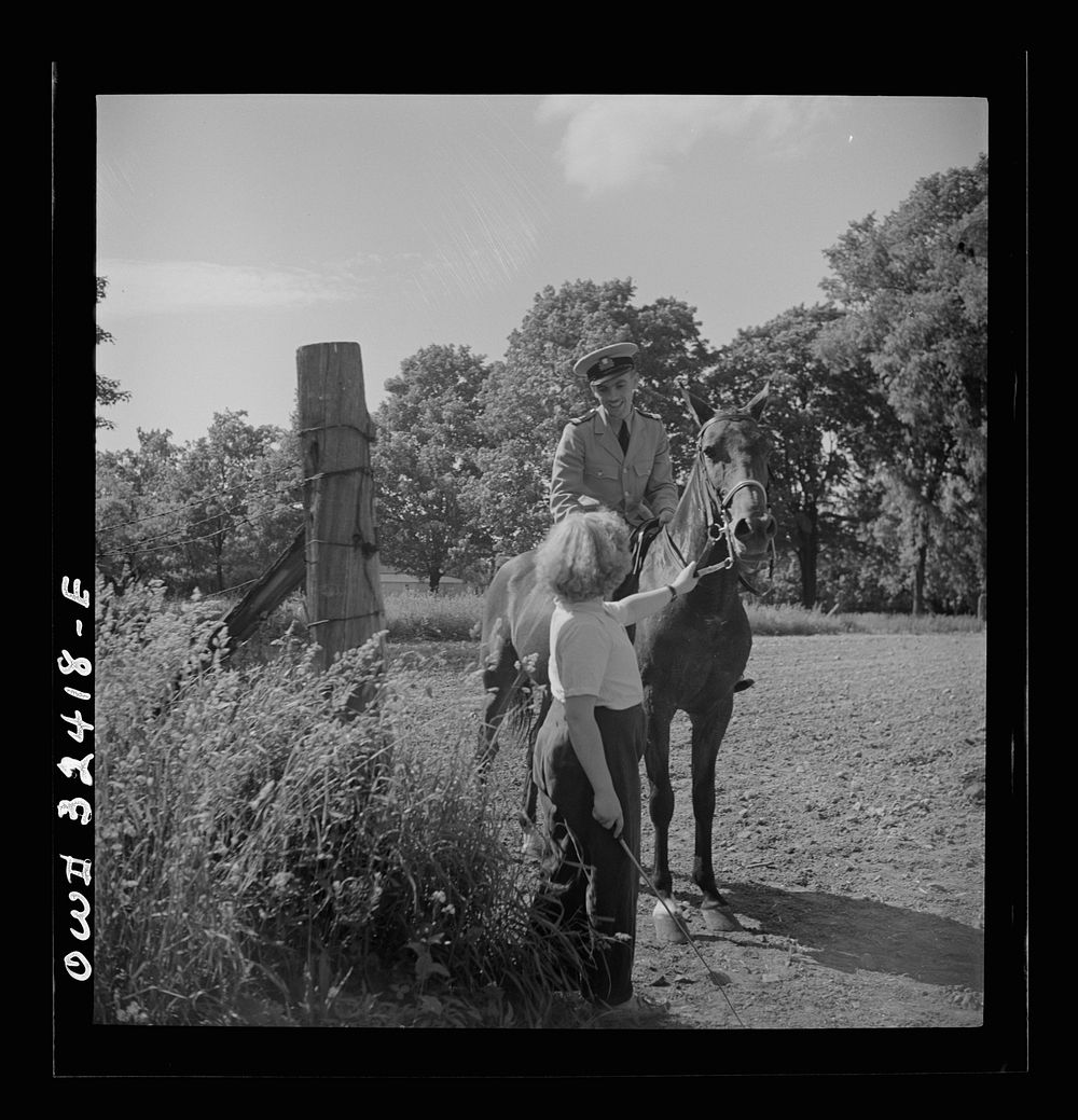 [Untitled photo, possibly related to: Oswego, New York. Polish naval officer riding a horse at a farm where the heroes were…