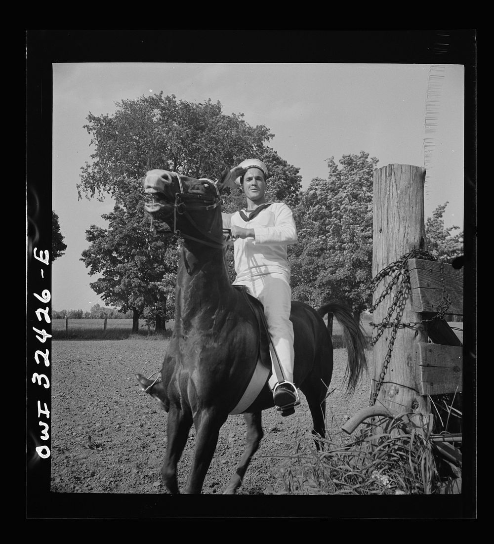 Oswego, New York. Belgian sailor riding at a farm where the heroes were entertained during United Nations week. Sourced from…