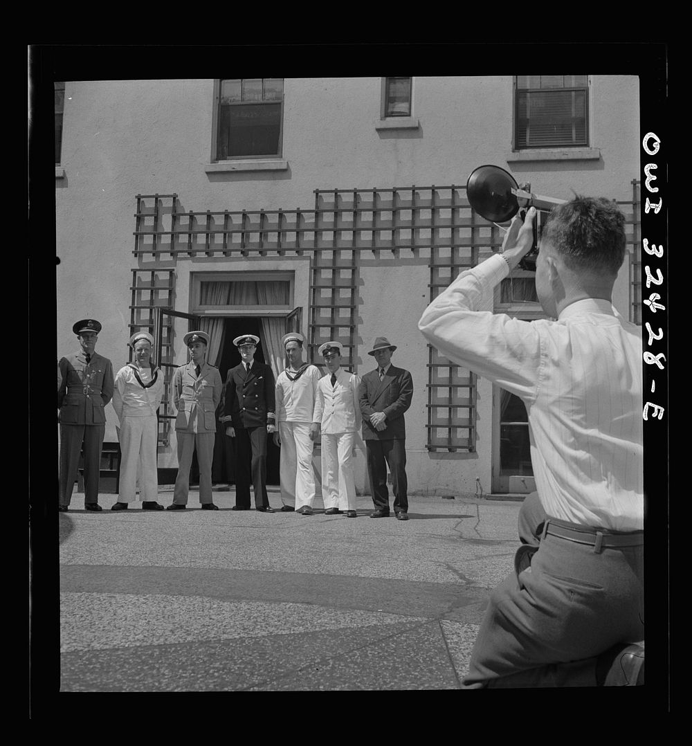 Oswego, New York. Heroes visiting during United Nations week lined up for a photograph by a local newspaper photographer.…
