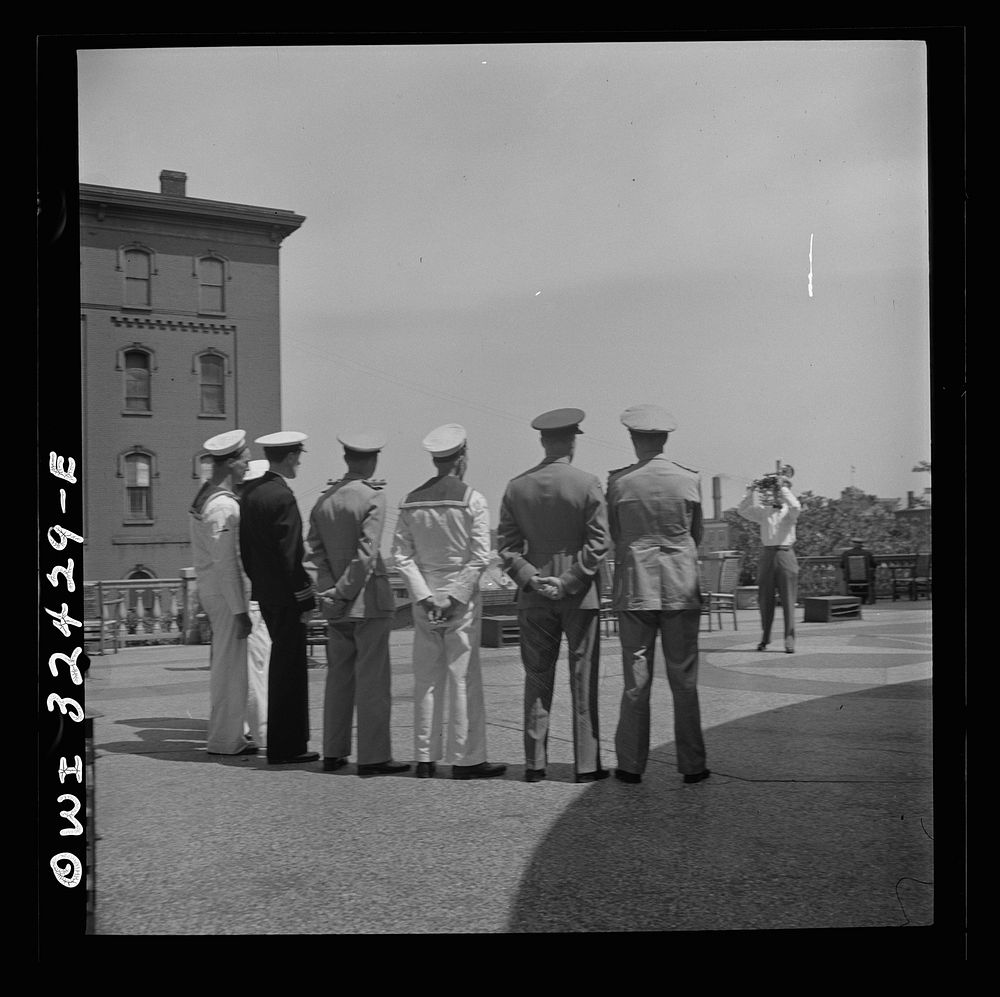 [Untitled photo, possibly related to: Oswego, New York. Heroes visiting during United Nations week lined up for a photograph…