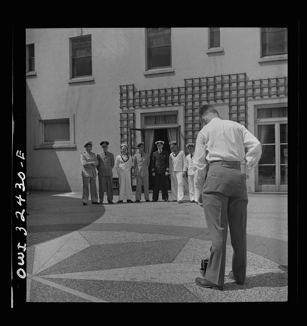 [Untitled photo, possibly related to: Oswego, New York. Heroes visiting during United Nations week lined up for a photograph…