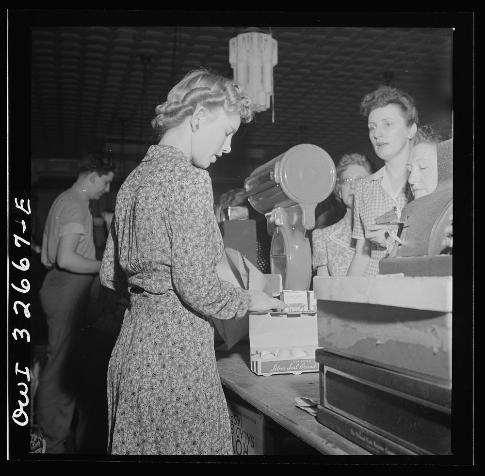 [Untitled photo, possibly related to: Washington, D.C. Louise Sprouse, a checker at the Acme grocery store on Fourteenth…