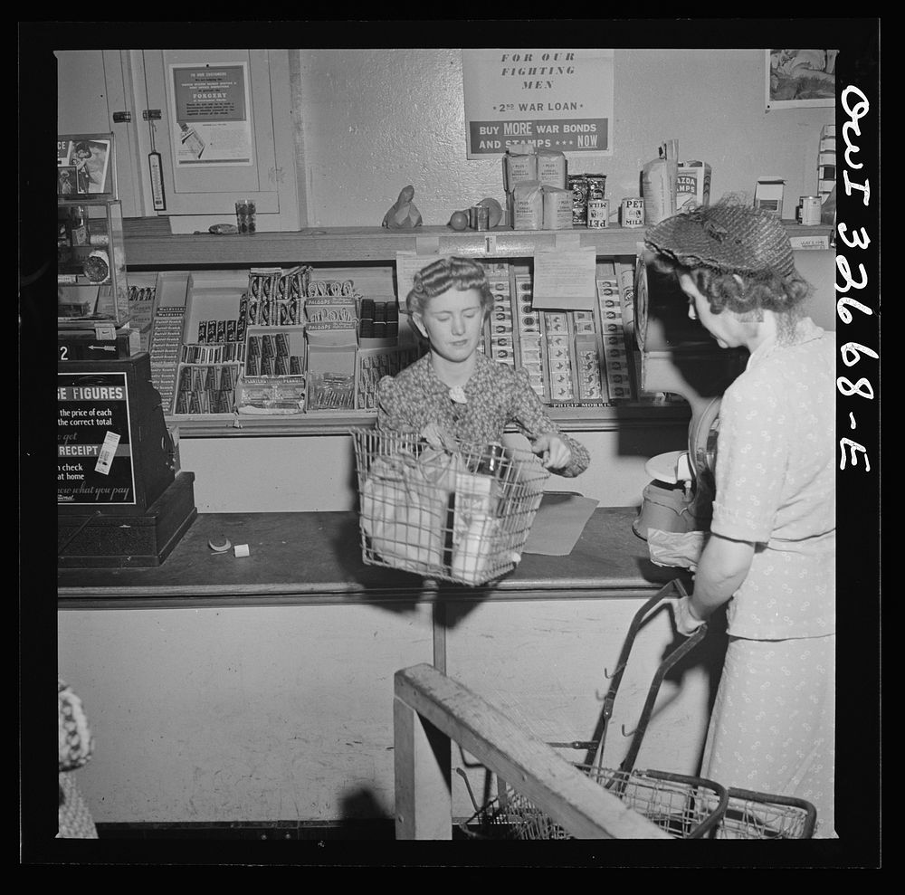 Washington, D.C. Louise Sprouse, a checker at the Acme grocery store on Fourteenth Street. She formerly lived in Blacksley…