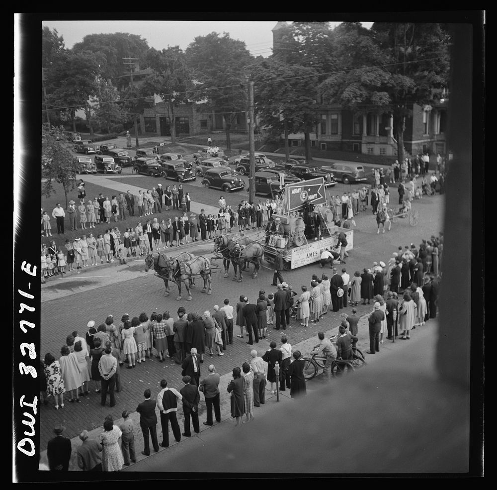 [Untitled photo, possibly related to: Oswego, New York. Ames Ironworks float, drawn by horses because of the gas rationing…