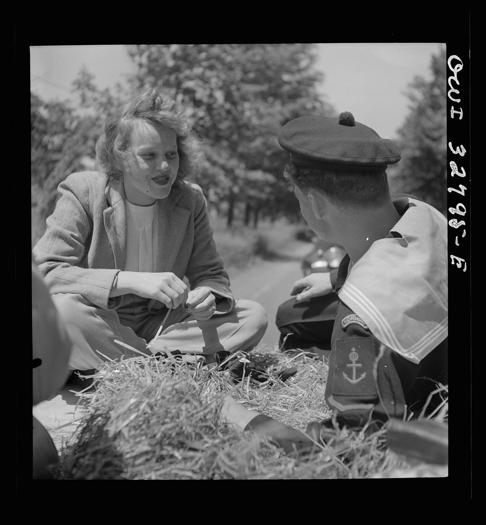 [Untitled photo, possibly related to: Oswego, New York. A Norwegian sailor and an Oswego girl on a hayride during United…
