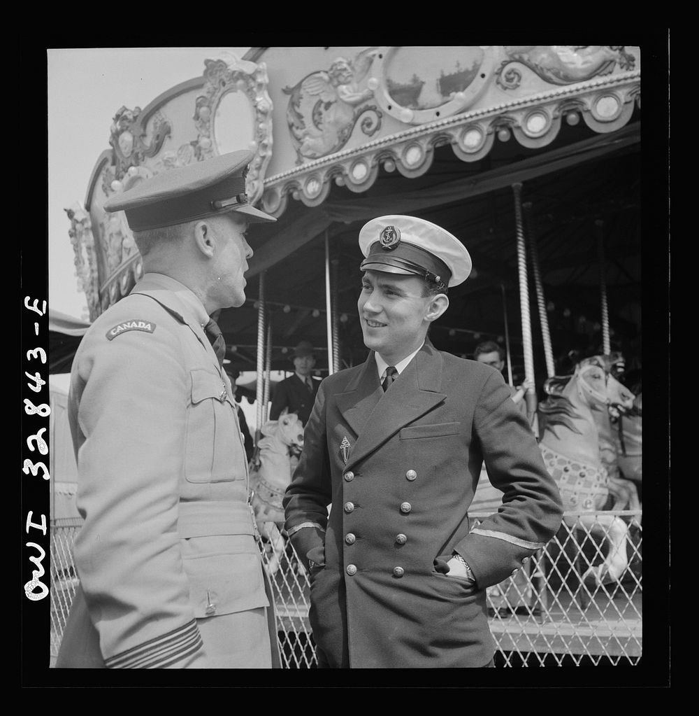 [Untitled photo, possibly related to: Oswego, New York. A Belgian sailor on the merry-go-round at the carnival during United…