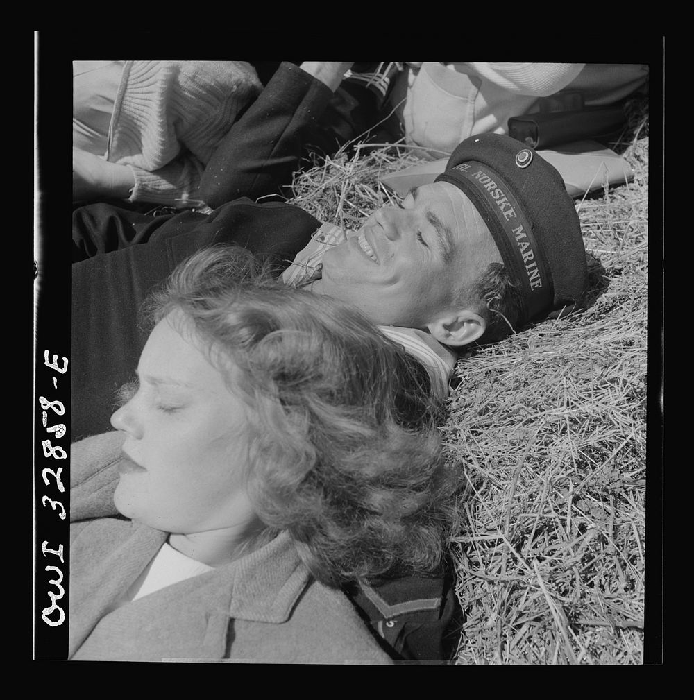 Oswego, New York. A Norwegian sailor and an Oswego girl on a hayride during United Nations week. Sourced from the Library of…