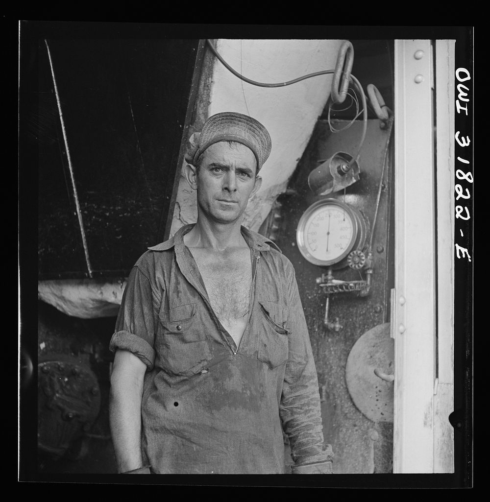 The fireman on the towboat Charles T. Campbell on the Ohio River. Sourced from the Library of Congress.