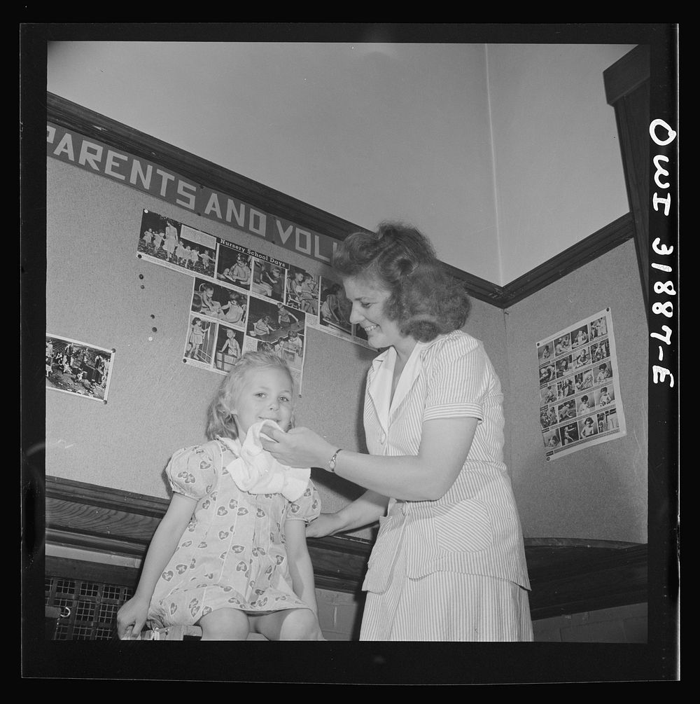 New Britain, Connecticut. A child care center, opened September 15, 1942, for thirty children, age two to five, of mothers…