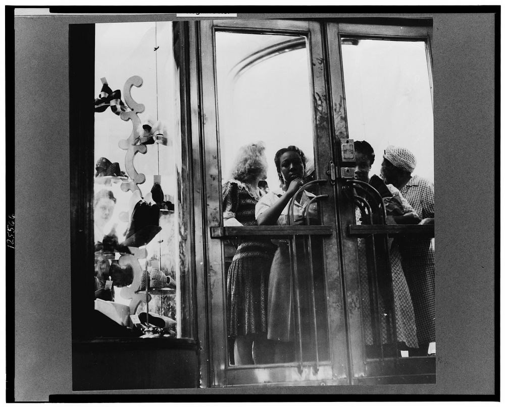 Washington, D.C. A group of people waiting for the shoe store to open on the last day on which war ration shoe coupon…