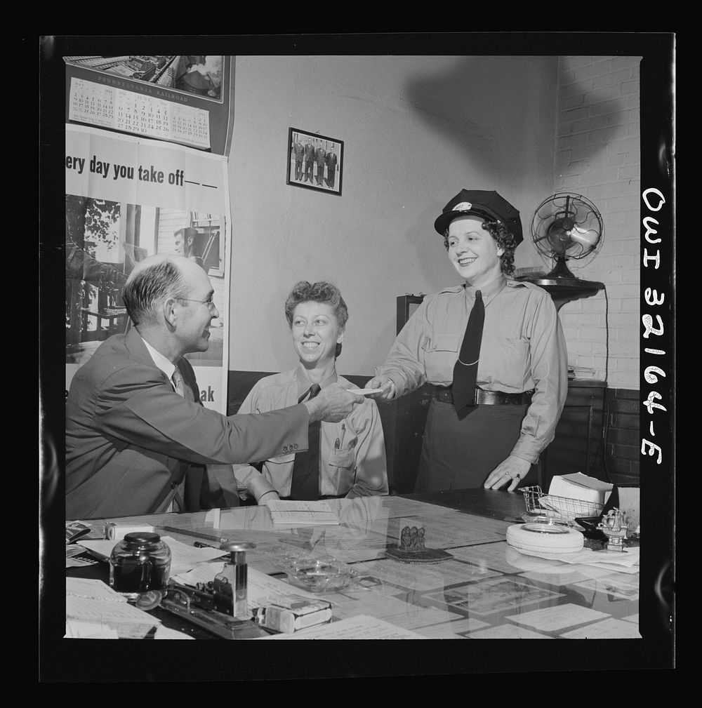Washington, D.C. Women streetcar and bus operators Hattie B. Sheehan (standing) and Frances Lewis being interviewed by…