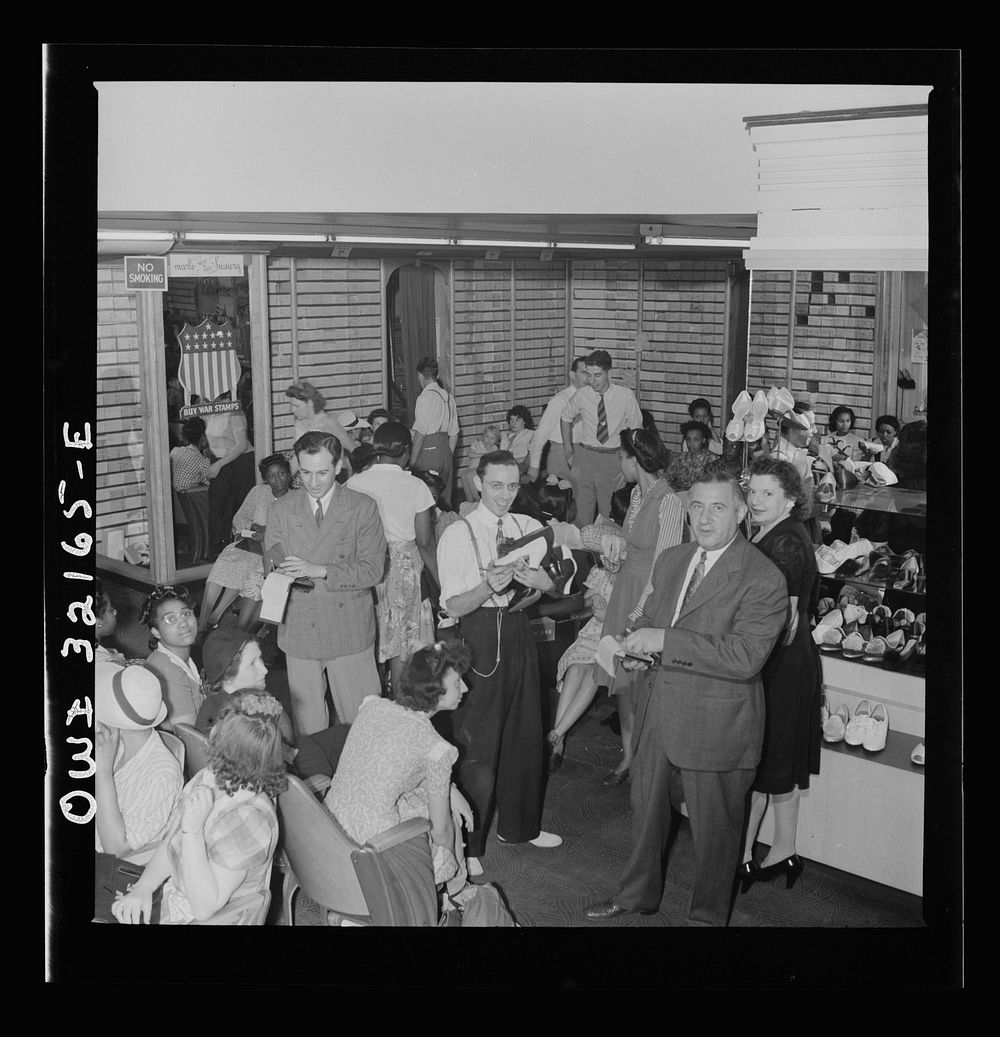 Washington, D.C. A busy shoe store on the last day on which war ration shoe coupon seventeen may be used. Sourced from the…