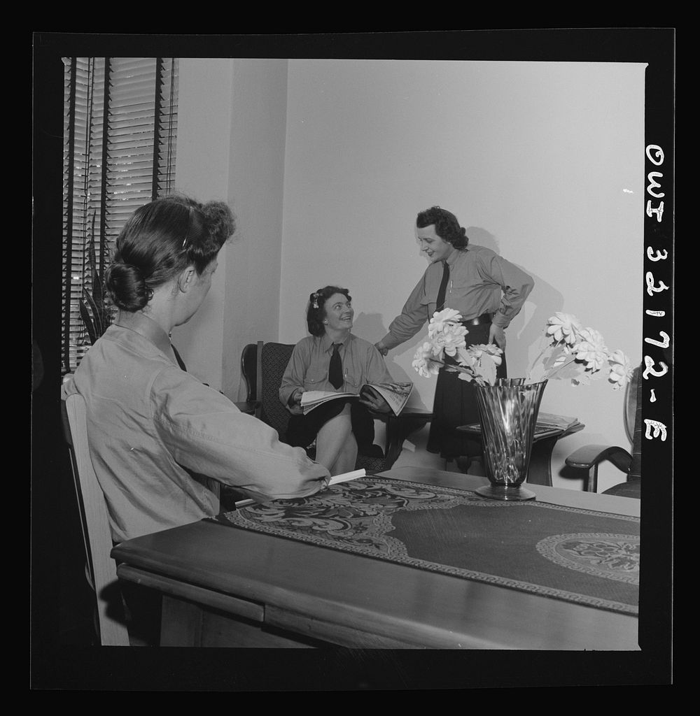 Washington, D.C. Women streetcar and bus operators relaxing between their runs. Sourced from the Library of Congress.