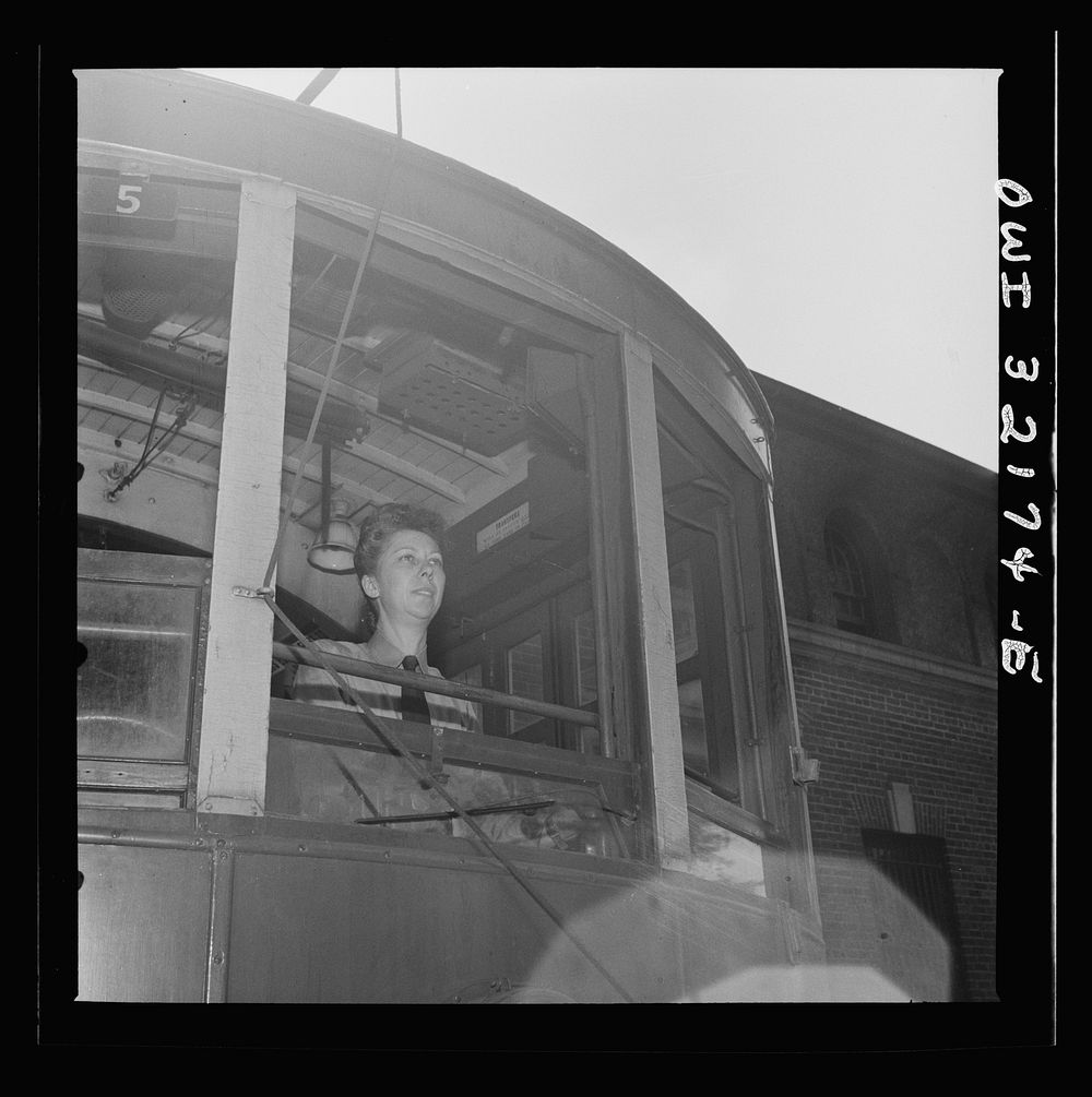 Washington, D.C. Miss Frances Lewis, the motorman of a two-man streetcar. Sourced from the Library of Congress.