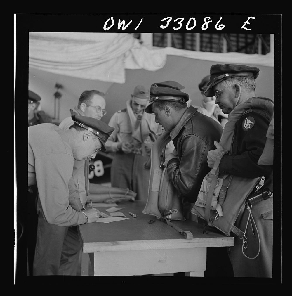 Bar Harbor, Maine. Civil Air Patrol base headquarters of coastal patrol no. 20. Routine check of "Mae West" life preservers.…