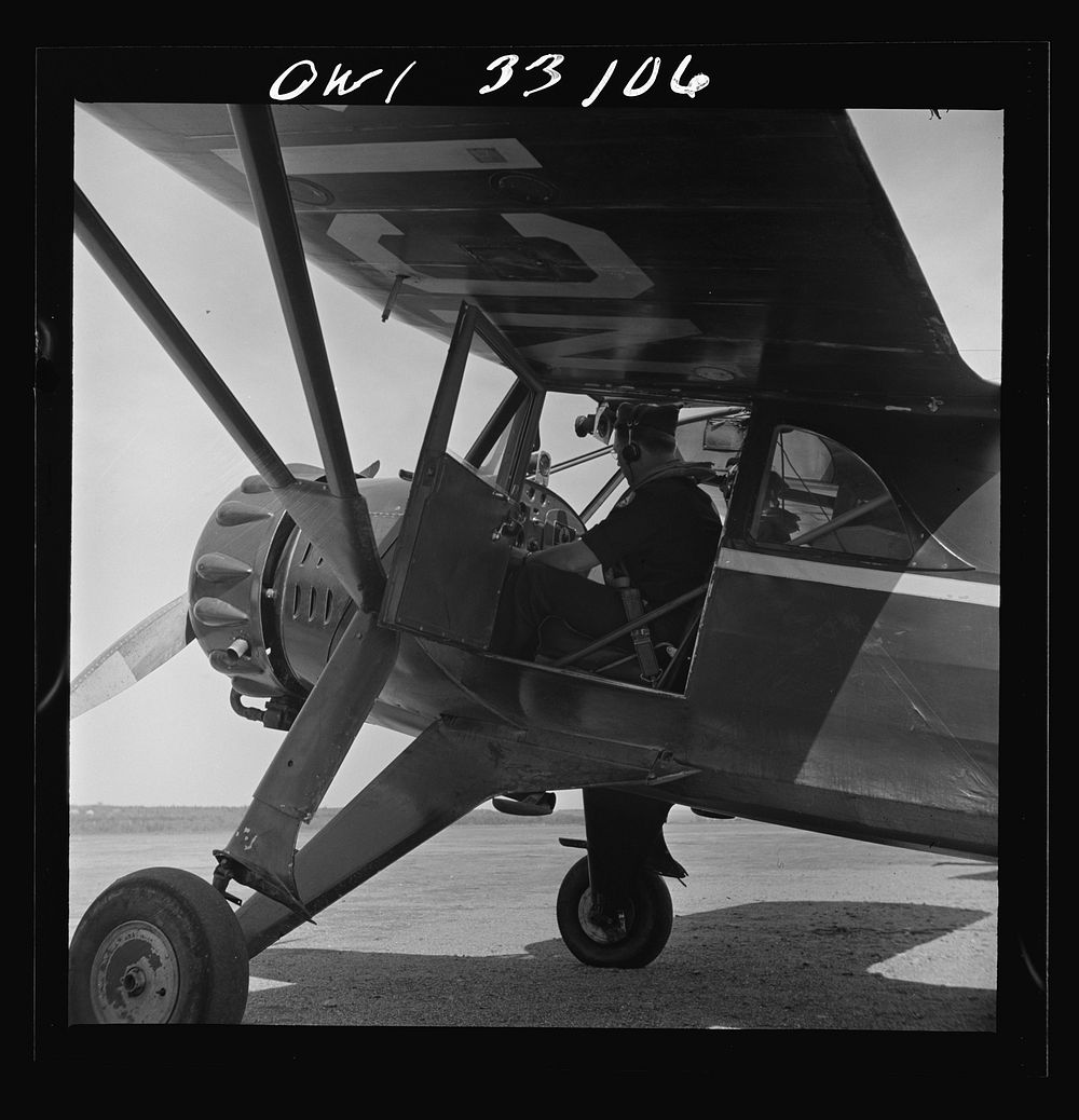 Bar Harbor, Maine. Civil Air Patrol base headquarters of coastal patrol no. 20. The pilot and an observer ready to take off.…