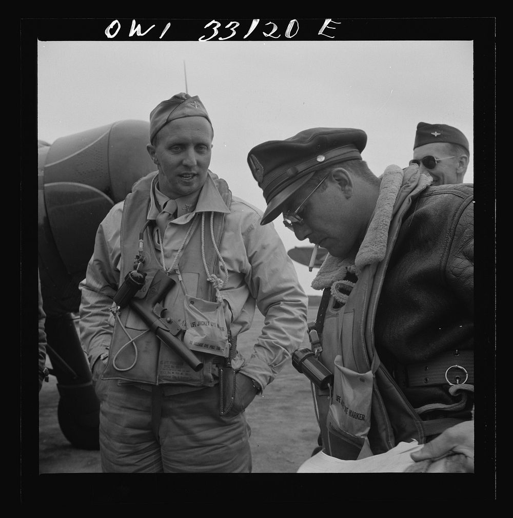 Bar Harbor, Maine. Civil Air Patrol base headquarters of coastal patrol no. 20. A pilot and an observer after completing a…