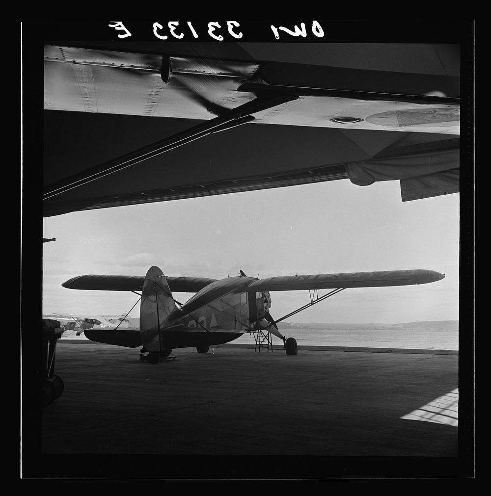 Bar Harbor, Maine. Civil Air Patrol base headquarters of coastal patrol no. 20. A patrol plane. Sourced from the Library of…