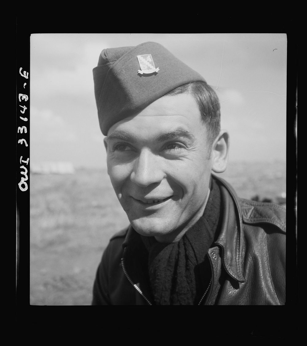 Technical Sergeant John A. Harkeli, twenty-four, gunner, of Manifold, Pennsylvania, a coal miner before the war. He is one…
