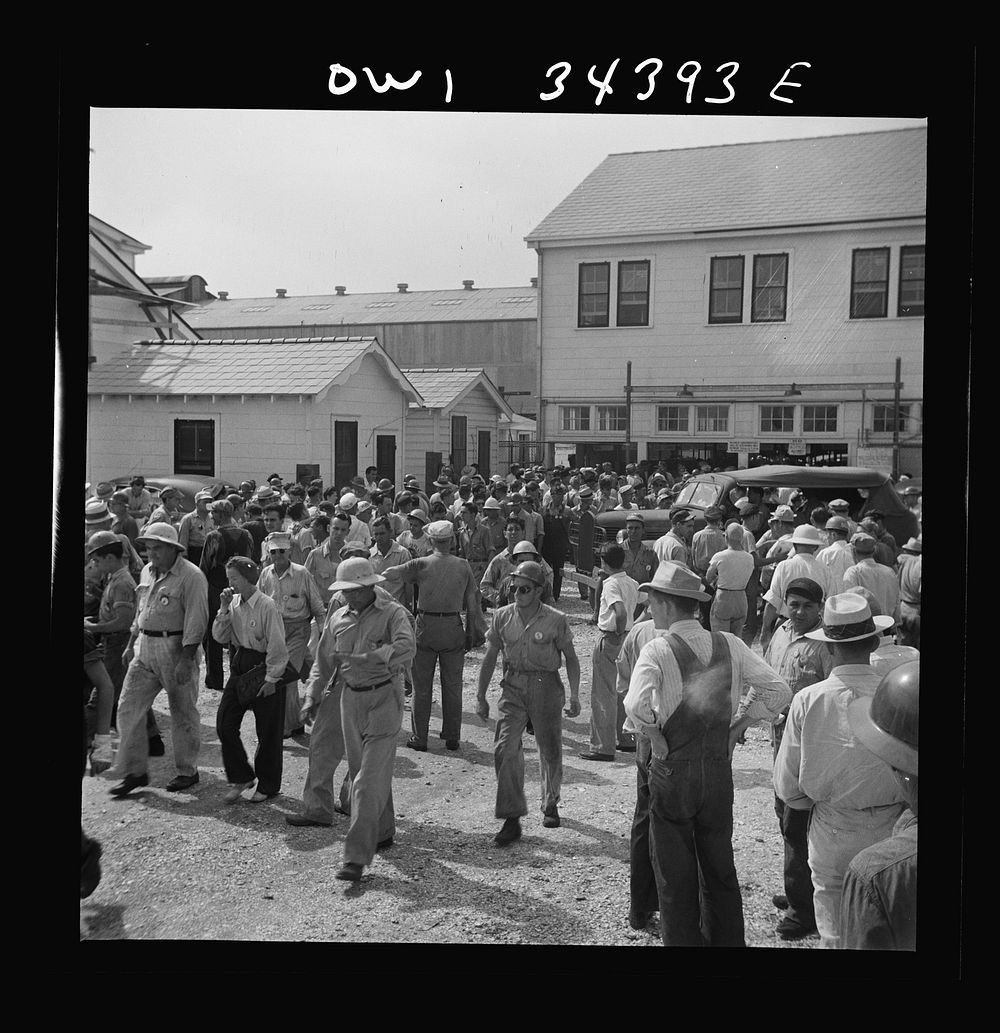 New Orleans, Louisiana. Workers leaving the Higgins shipyards at four p.m.. Sourced from the Library of Congress.