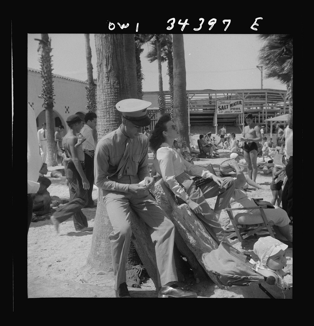 Corpus Christi, Texas. Soldiers and girl at the beach. Sourced from the Library of Congress.
