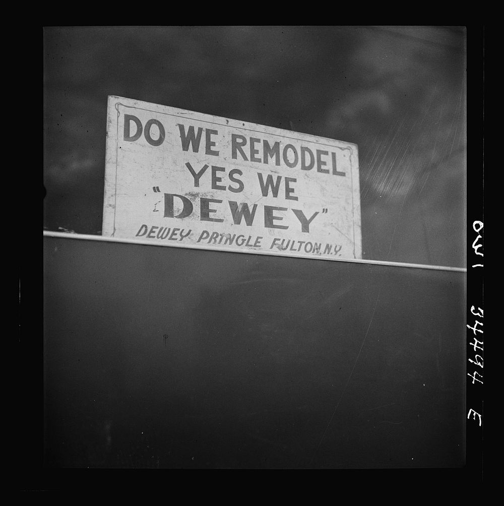 Oswego, New York. A sign on a store. Sourced from the Library of Congress.