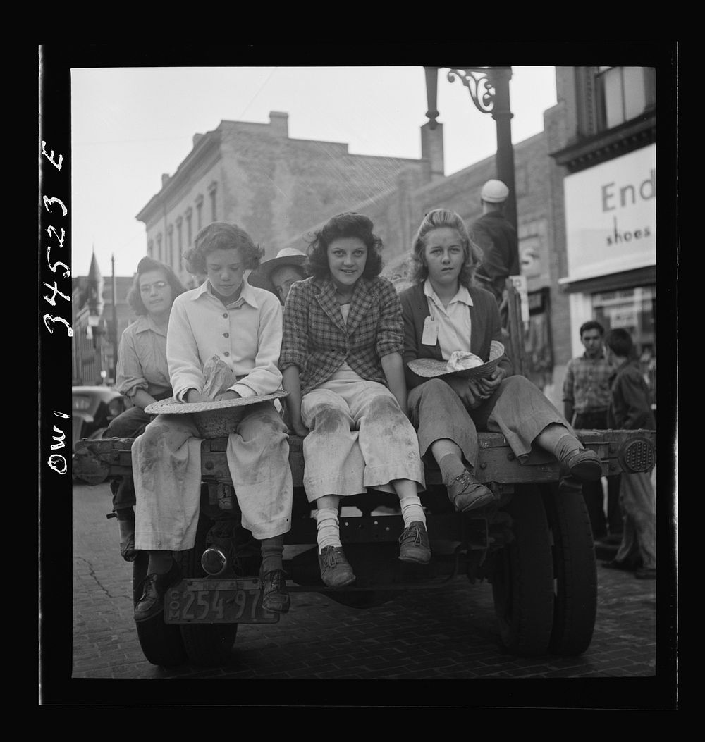 Oswego, New York. Children, recruited for farm work during the summer, waiting to start for work outside the U.S. Employment…