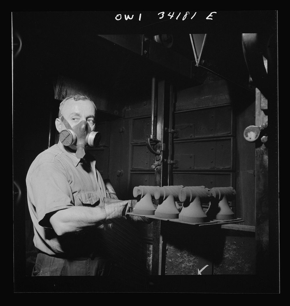 New Britain, Connecticut. Hot cores to be used by the U.S. Army to make molds for meat choppers at the Landers, Frary and…