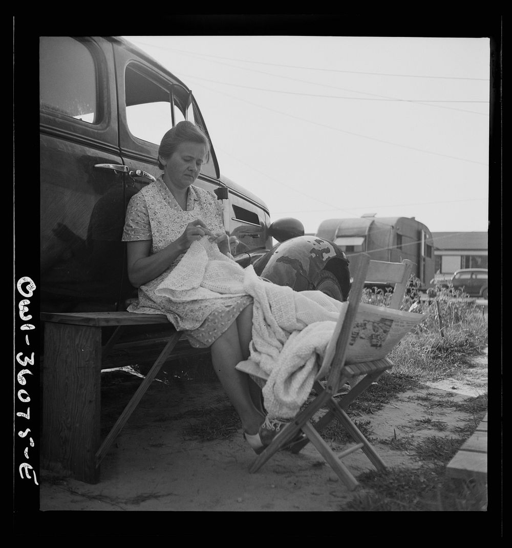 Middle River, Maryland. FSA (Farm Security Administration) housing project for the Glen L. Martin aircraft workers. Woman…