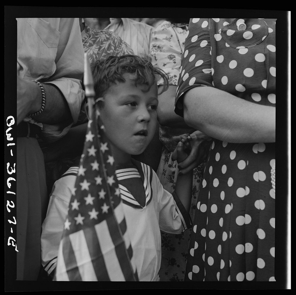 Washington, D.C. Spectators at the parade to recruit civilian defense volunteers. Sourced from the Library of Congress.