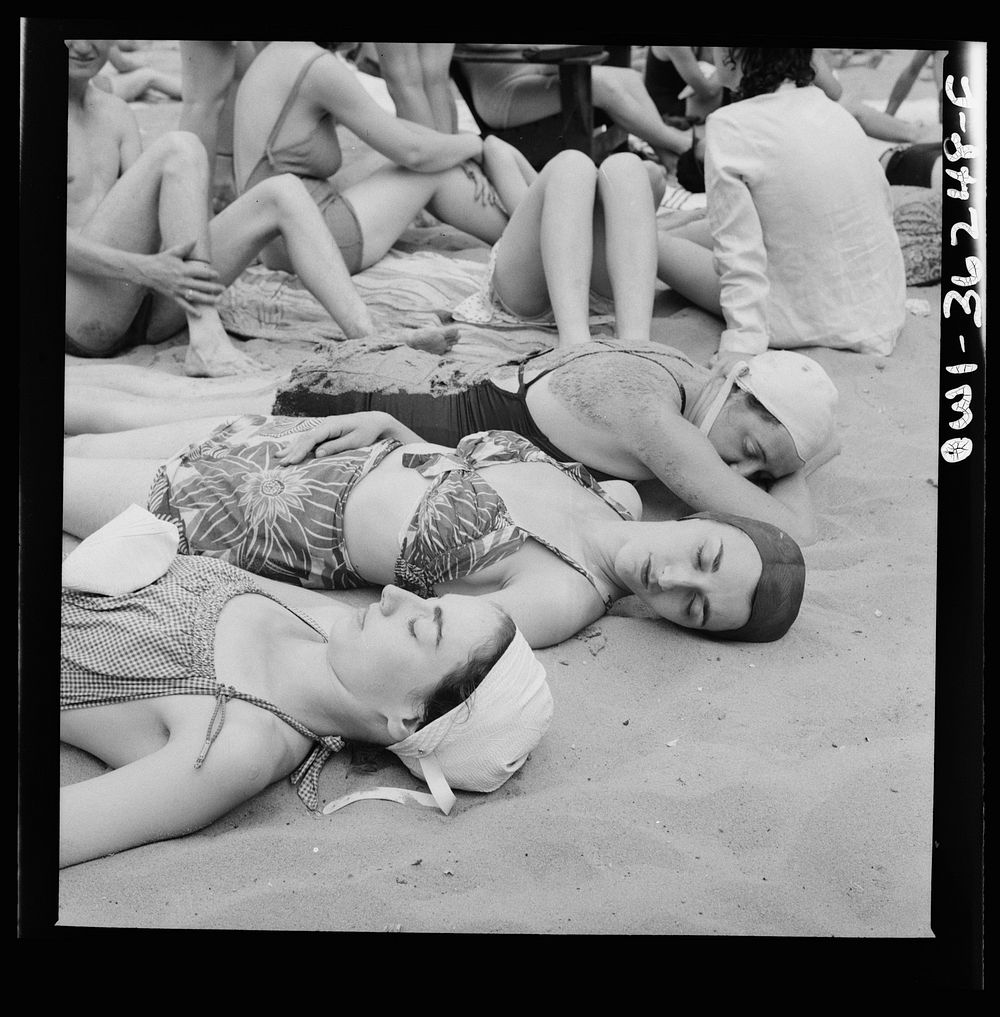 Glen Echo, Maryland. Sun bathers on the sand beach at the swimming pool in the Glen Echo amusement park. Sourced from the…