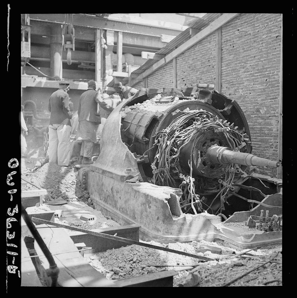 [Untitled photo, possibly related to: La Goulette, Tunisia. Wrecked turbine which formerly provided electric power for the…