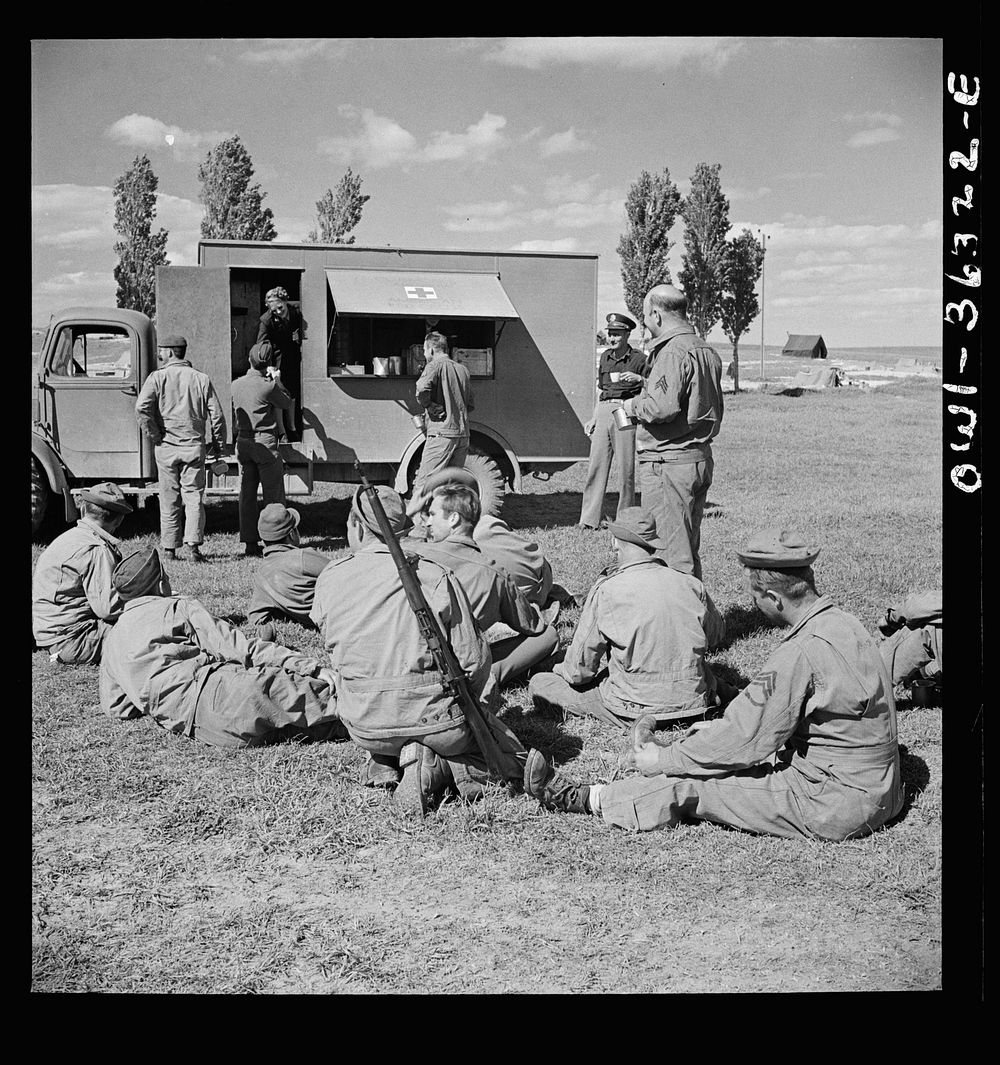 [Untitled photo, possibly related to: Constantine (vicinity), Algeria. Red Cross clubmobile serving refreshments to an anti…