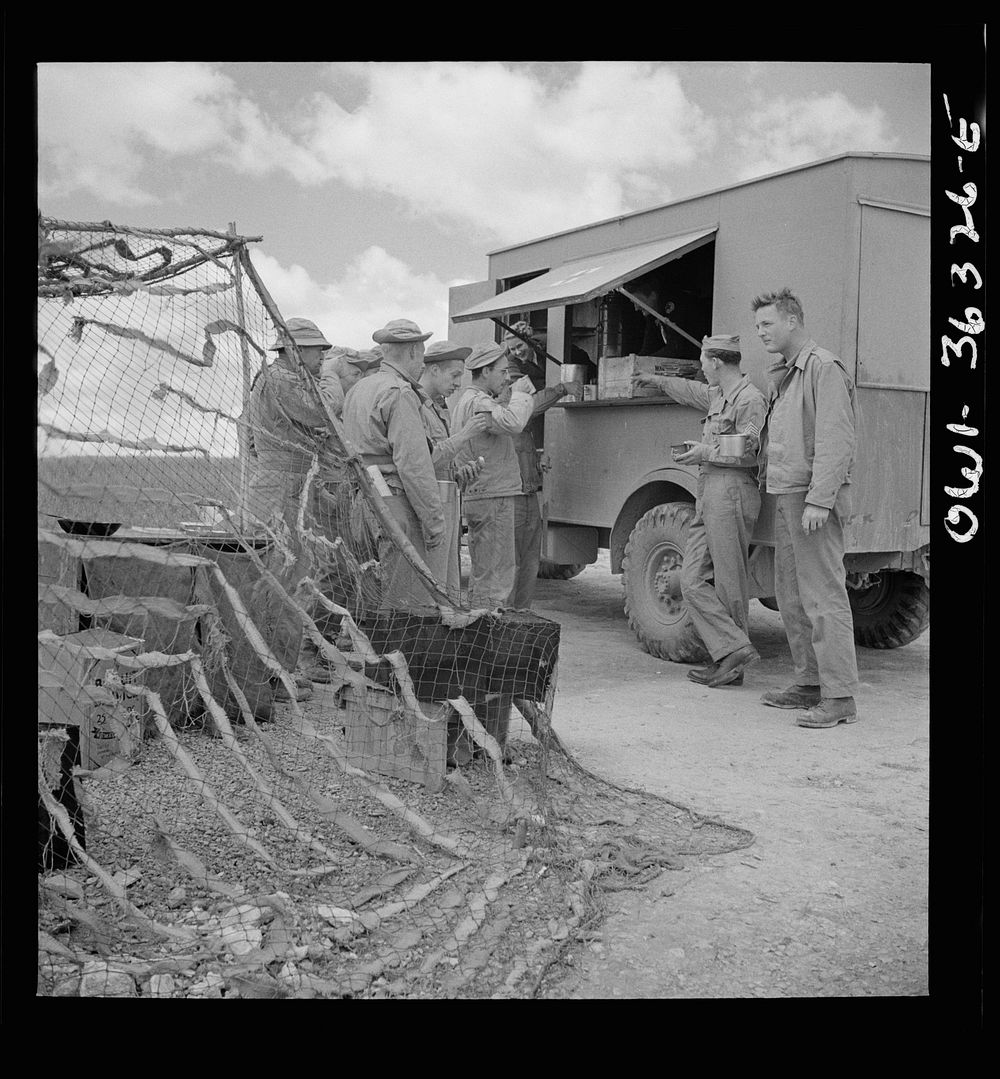 [Untitled photo, possibly related to: Constantine (vicinity), Algeria. Red Cross clubmobile serving refreshments to an anti…